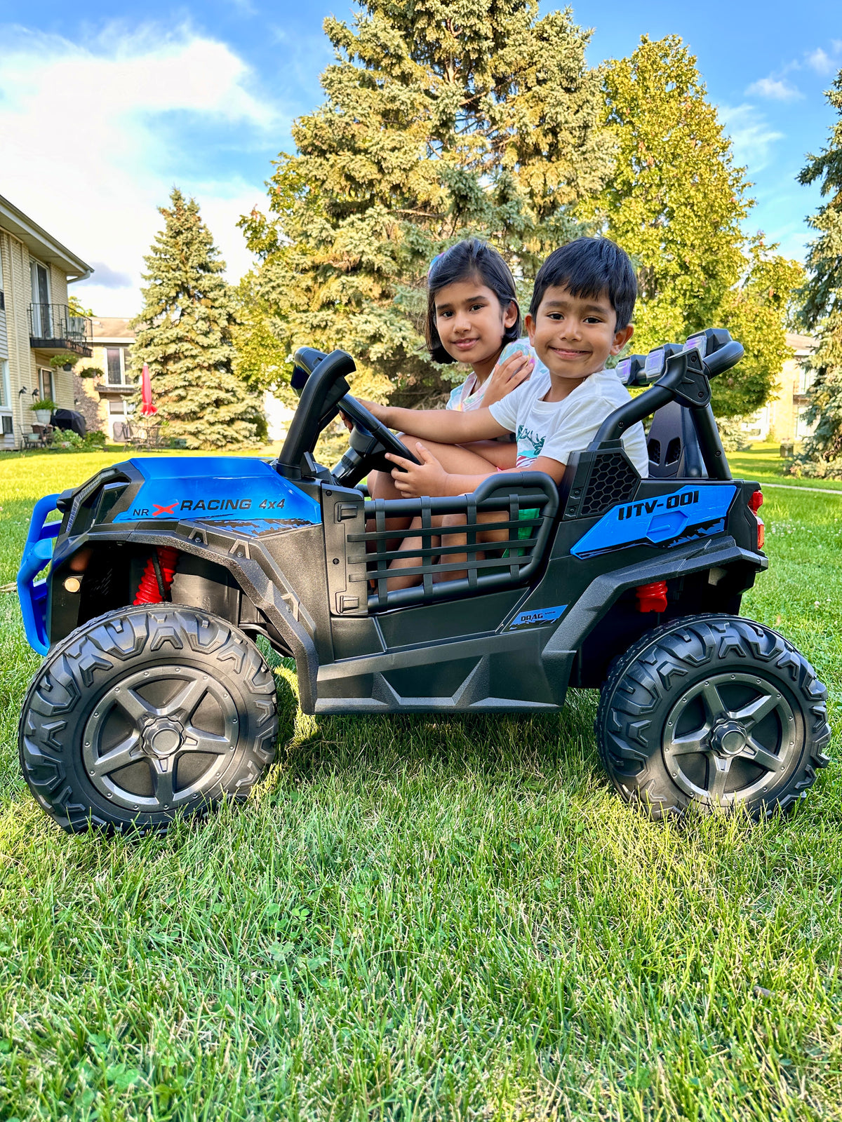 XJD 12V/24V 7AH Kids Ride On Truck Car w/Parent Remote Control, Spring Suspension, LED Lights, AUX Port - Blue